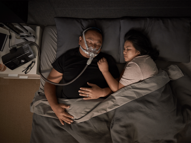Man sleeping with Resmed AirFit F30
