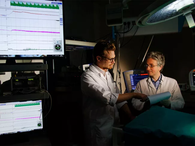 Renaud Tissier at the controls of the liquid ventilation resuscitation system in the operating room