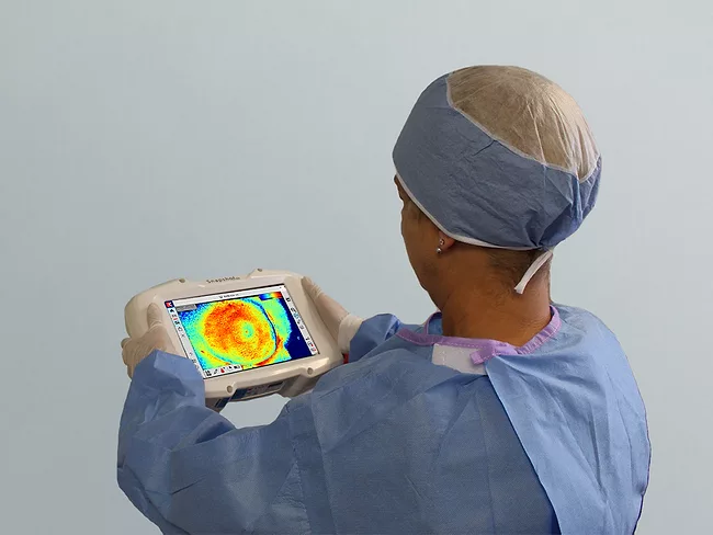 Person in hospital scrubs uses Snapshot