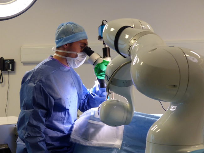 Doctor using robot during surgery