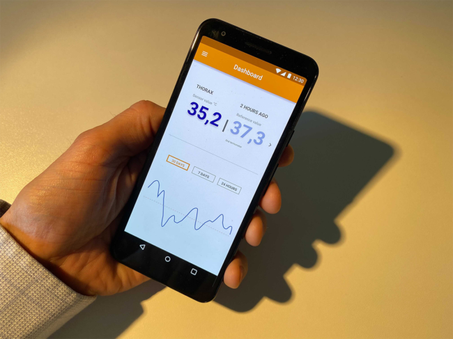 Smartphone app shows temperature readings from injected chip