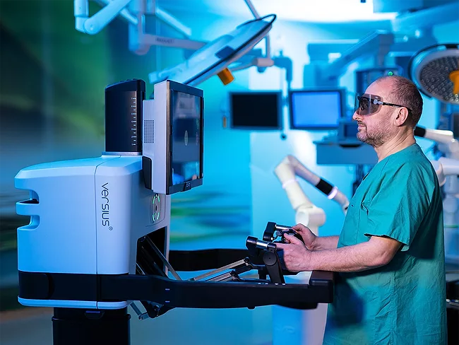 Surgeon at Versius console