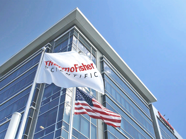 Thermo Fisher flag and US flag, outside HQ