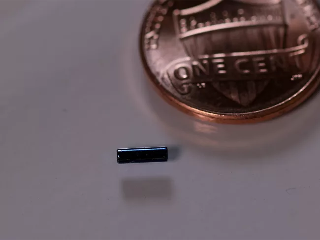 Microrobotic next to penny