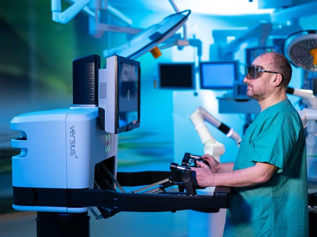 Surgeon at Versius console