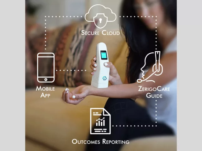 Woman using Zerigo device on forearm