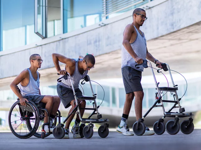 Person transitioning from wheelchair to walking