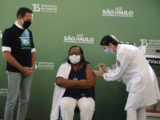 Patient gets COVID-19 vaccine in Brazil