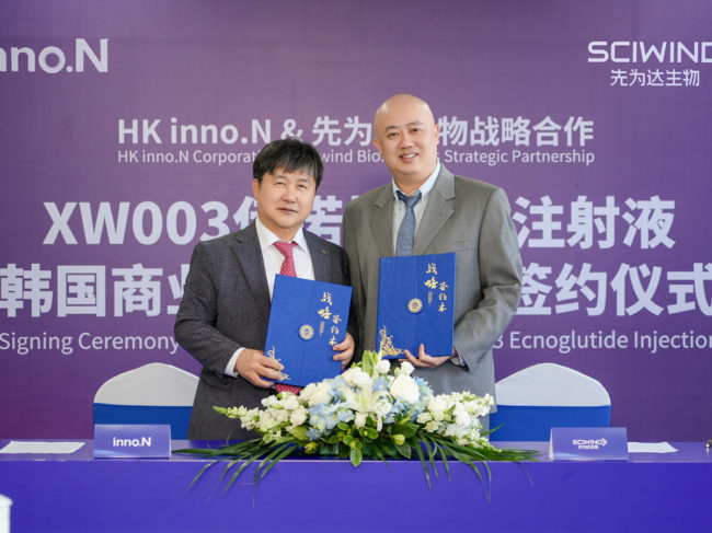 HK Inno.N CEO Dal-won Kwak (left) and Sciwind Biosciences CEO Hai Pan