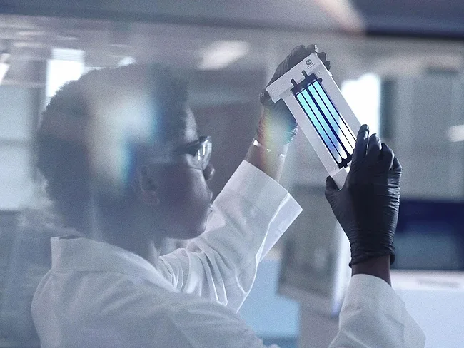 Tempus AI researcher in lab