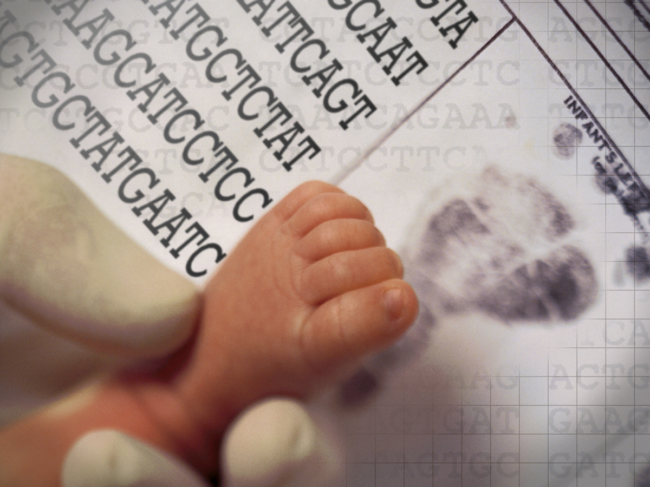 Newborn baby feet and DNA base pair letters A, T, C and G.