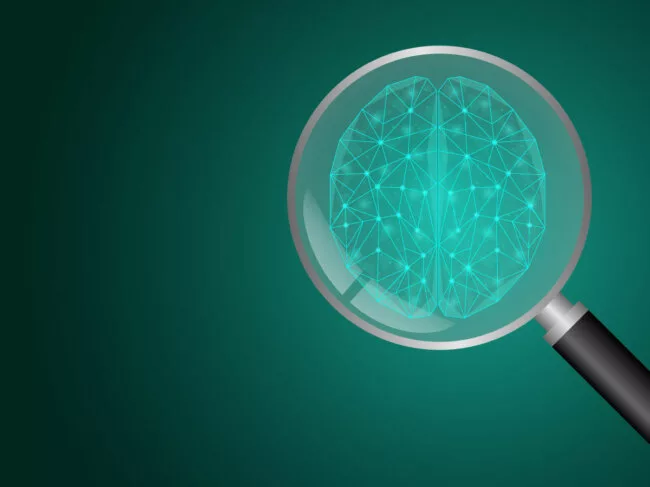 Illustration of magnifying glass inspecting brain