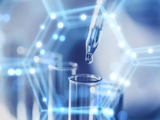 Photo of dropper with test tubes