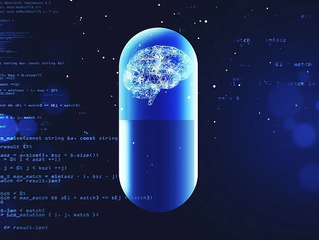 Capsule with brain on programming background.jpg