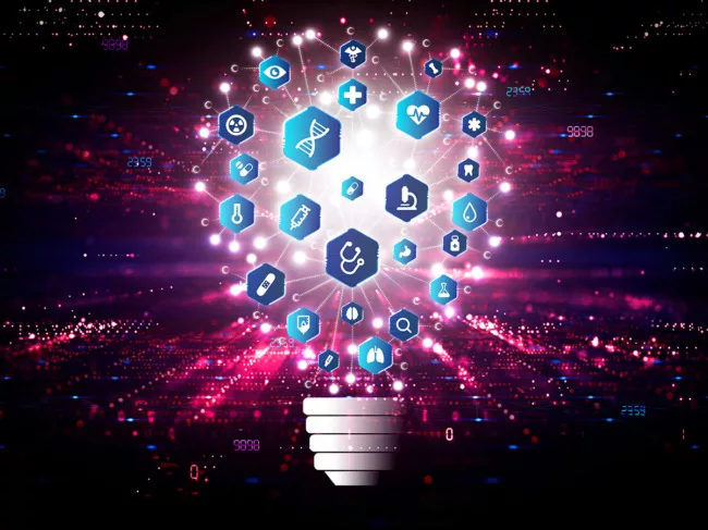 Illustration of a light bulb made up of medical research icons