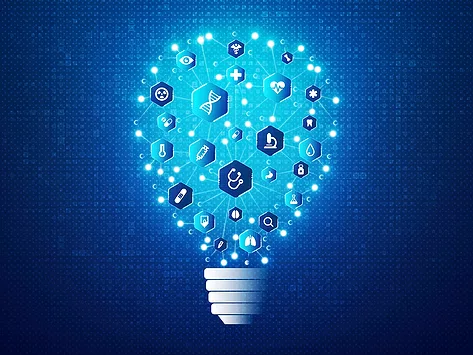 Clinical research concept with medical icons on light bulb