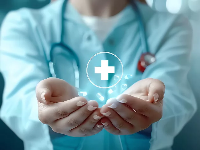 Female healthcare professional holding health icon