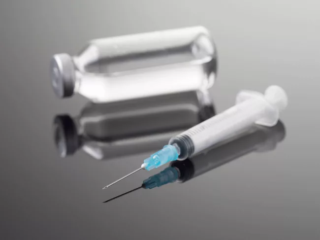 Clinical-trial-syringe-and-vial.png