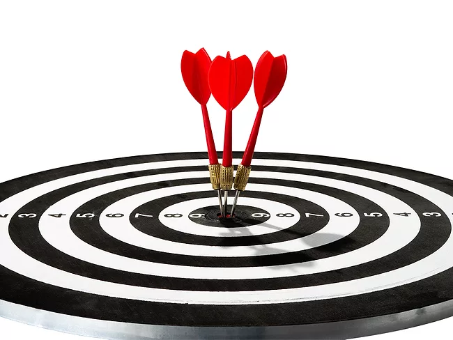 Three red darts on target