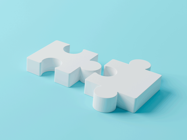 White puzzle pieces on blue background