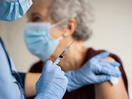 Older woman receiving vaccine