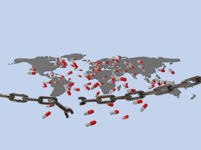 Drug capsules, broken chain over world map