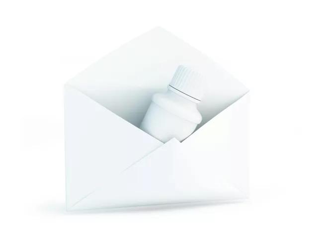 Bottle inside envelope