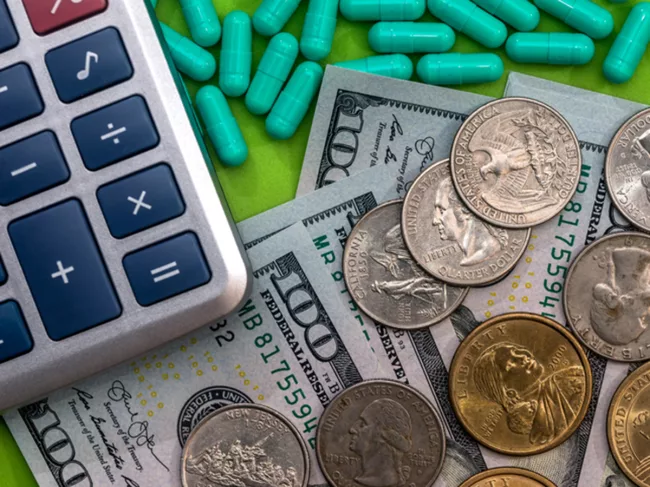 Drug-prices_money_calculator_pills