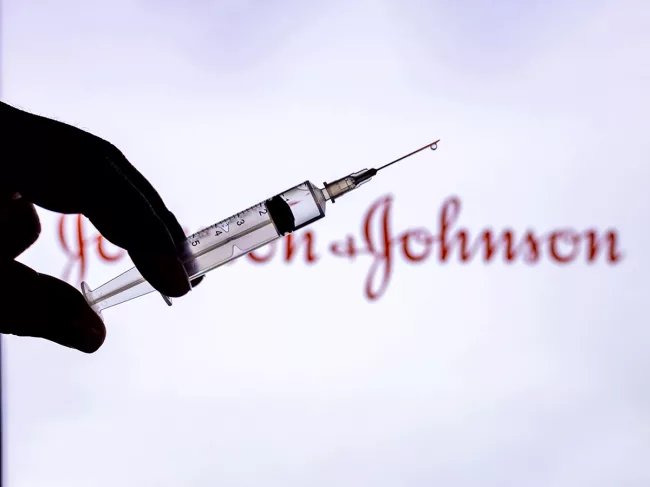 Syringe with Johnson and Johnson logo