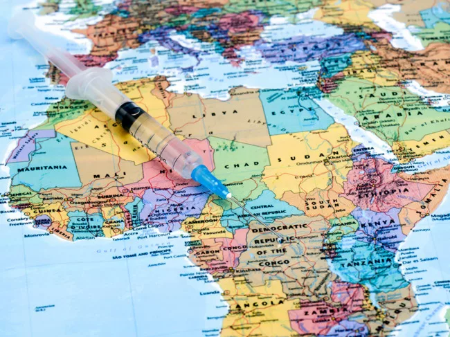 Syringe on map of Africa