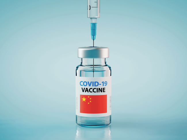 COVID-19 vaccine and syringe with flag of China