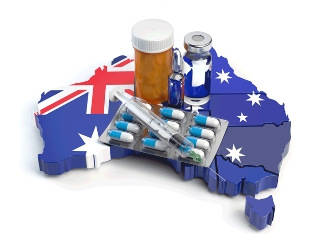 Map of Australia with pills, vials and syringe