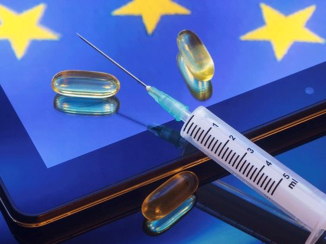 EU flag, syringe, capsules
