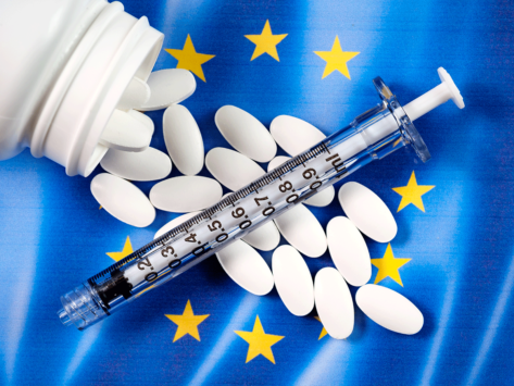 EU flag, pills, syringe