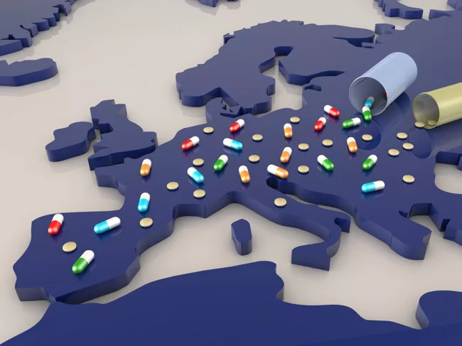 Medicine spilling onto map of Europe