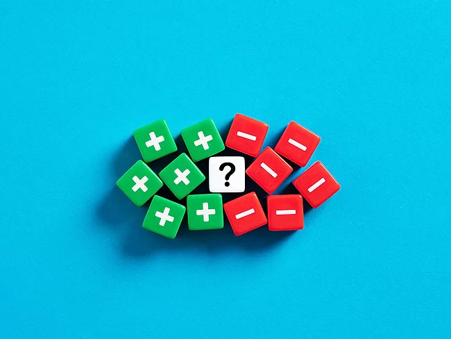 Green plus, red minus, white question mark dice