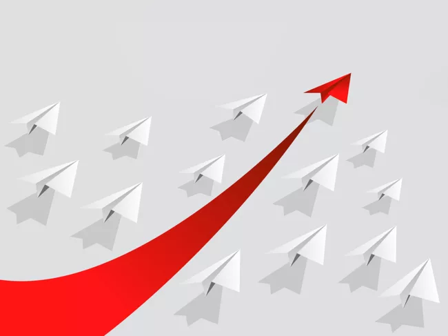 Paper airplanes with red leading