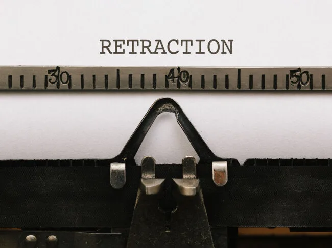 Retraction spelled out on typewriter