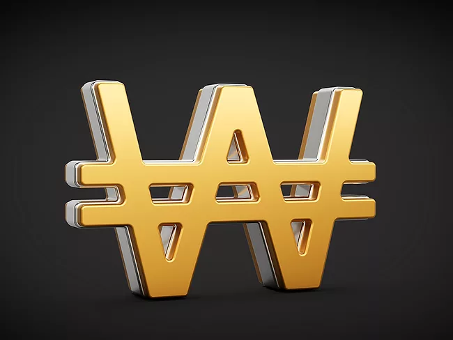 Gold won currency symbol on black background