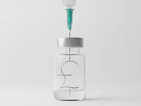 Syringe vial with pound currency symbol