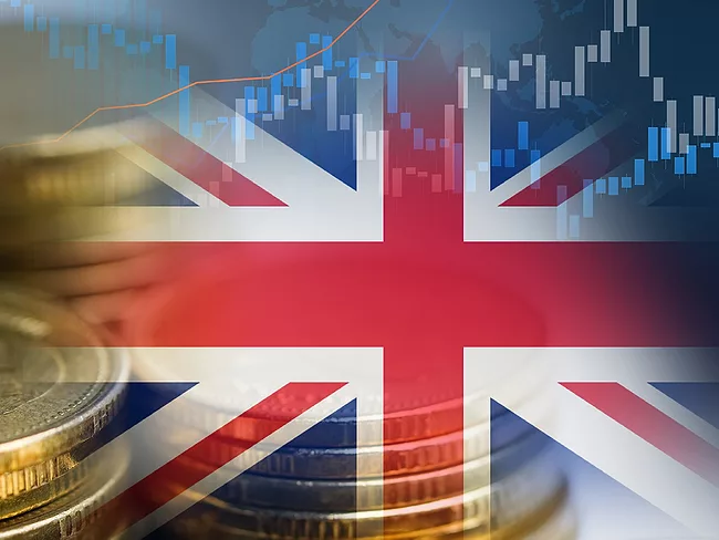 UK flag, coins, charts