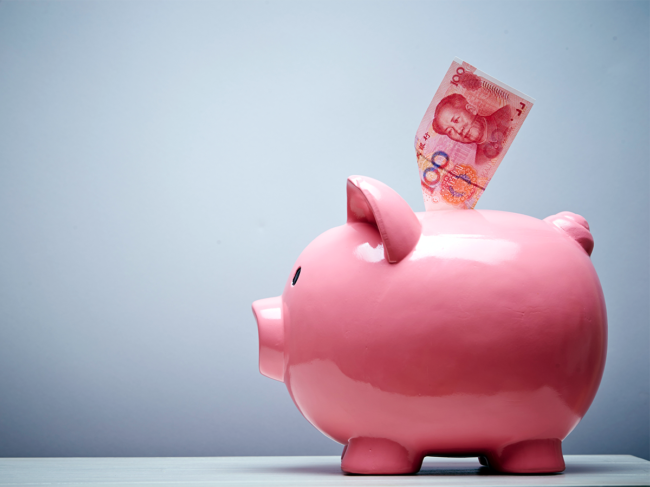 Chinese yuan and piggy bank