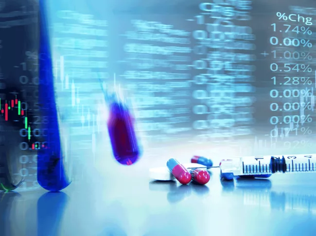 Financial charts, test tubes, capsules, syringe