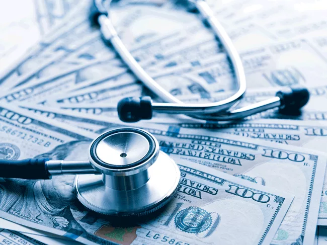 Health-care-costs-cash-stethoscope.png