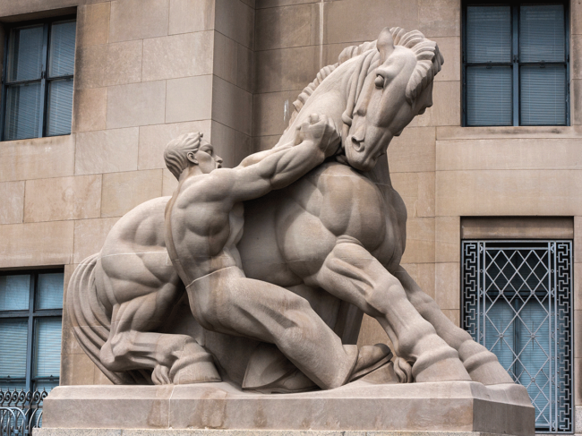 Statue of man and horse outside of U.S. FTC building
