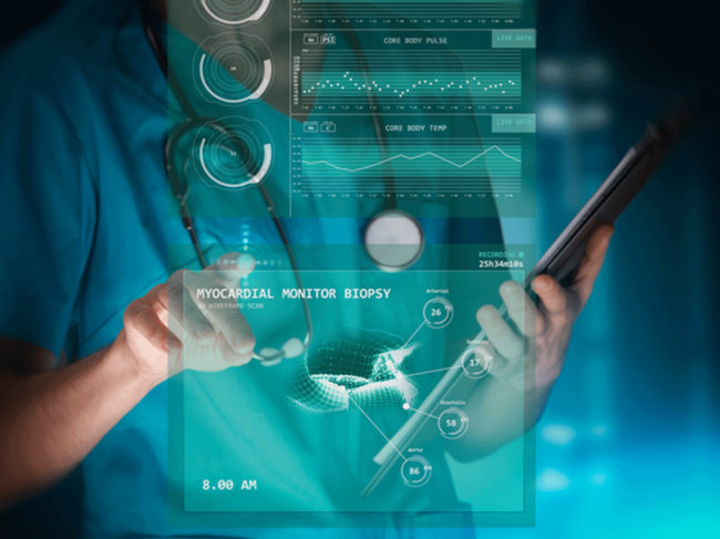 Health professional reviewing digital health data