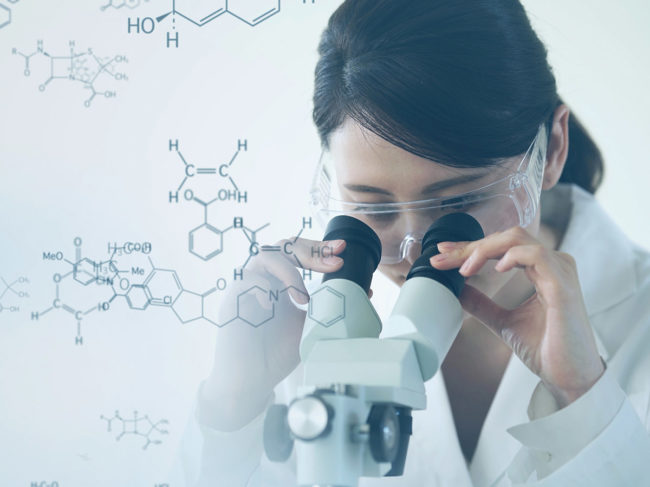 Scientist looking in microscope, chemical structure concept image