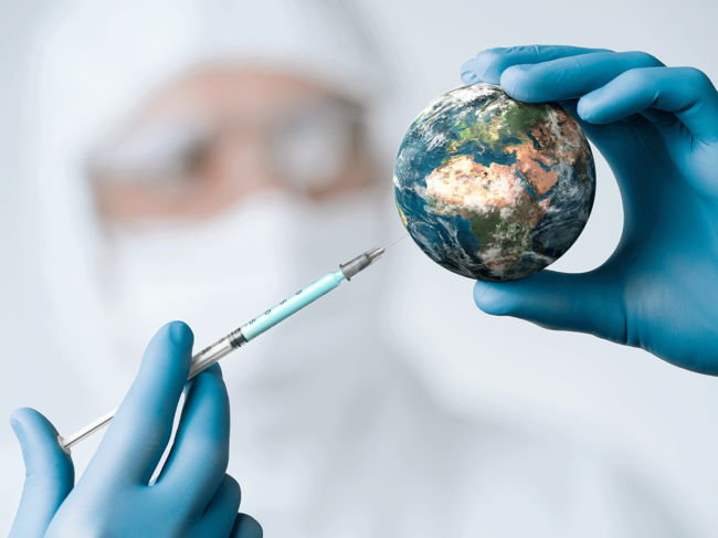 Scientist injecting vaccine into Earth