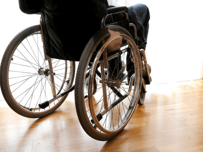 Person sitting in wheelchair