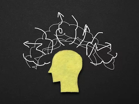 Scribbles above silhouette